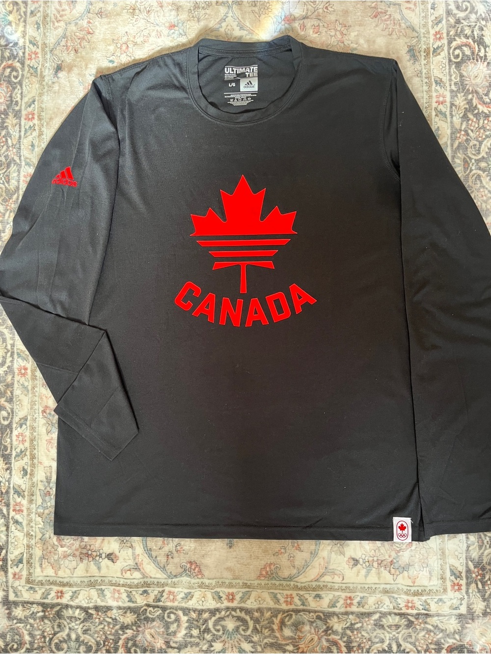 adidas Black Long-Sleeve Performance Shirt with Red Canada Leaf